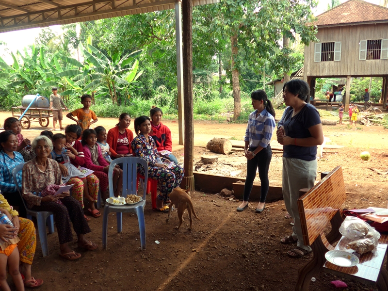 Vichuta Ly and the Legal Services for Children and Women staff visit a village in Kampong Cham, Cambodia to raise awareness about human trafficking and labor laws in Thailand. 22 August 2016.  © 2016 Storm Tiv for GAATW